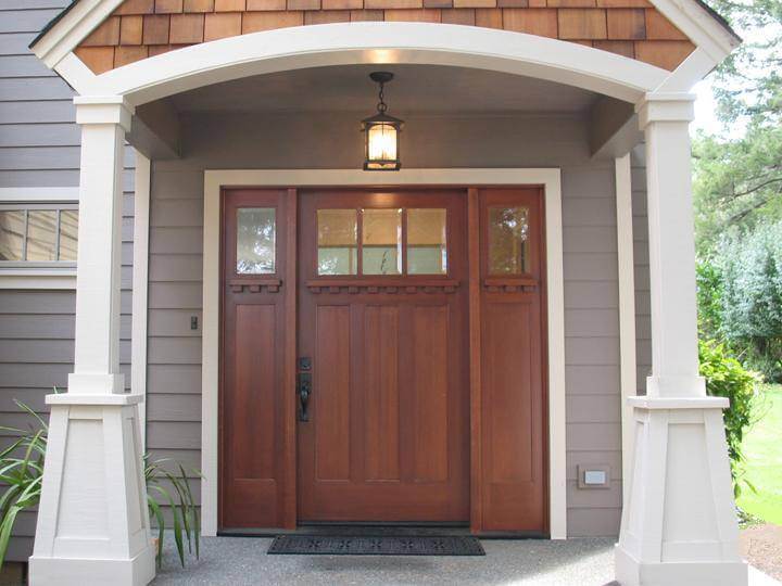Craftsman style door with sideltes.